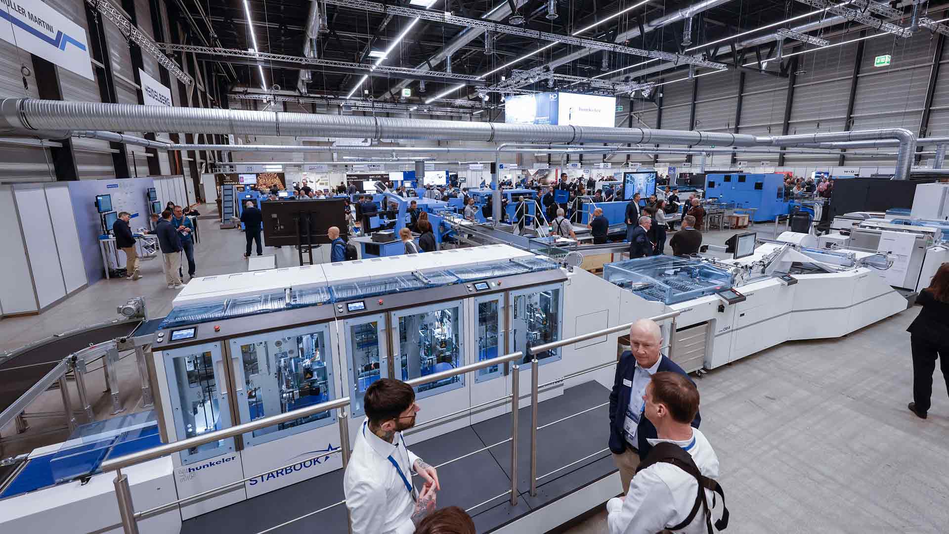 Impressionen an den Hunkeler Innovationdays 2025 am Müller Martini, HP und Heidelberg Stand.