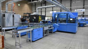 Müller Martini Dreischneider Infinitrim Stacker.